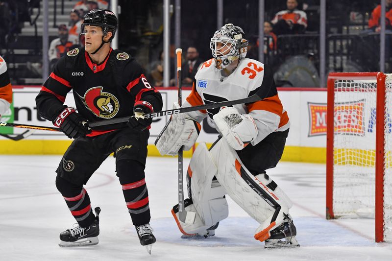 Mar 2, 2024; Philadelphia, Pennsylvania, USA;  Ottawa Senators defenseman Jakob Chychrun (6) and Philadelphia Flyers goaltender Felix Sandstrom (32) battle for position during the second period at Wells Fargo Center. Mandatory Credit: Eric Hartline-USA TODAY Sports