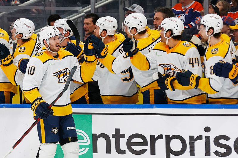 Jan 27, 2024; Edmonton, Alberta, CAN; The Nashville Predators celebrate a goal scored by forward Colton Sissons (10) during the third period against the Edmonton Oilers at Rogers Place. Mandatory Credit: Perry Nelson-USA TODAY Sports