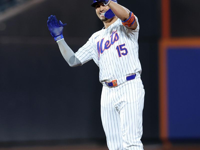 Sep 18, 2024; New York City, New York, USA; New York Mets right fielder Tyrone Taylor (15) celebrates his RBI double against the Washington Nationals during the fourth inning at Citi Field. Mandatory Credit: Brad Penner-Imagn Images