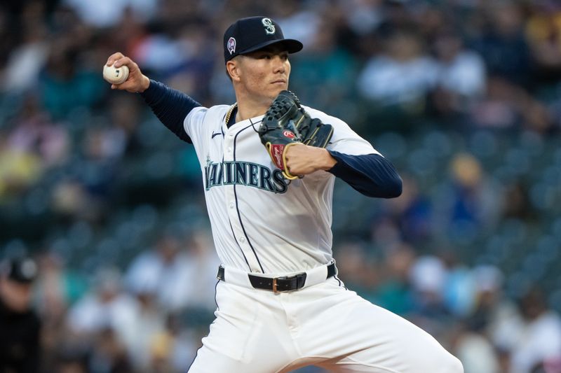 Sep 11, 2024; Seattle, Washington, USA;  Seattle Mariners starter Bryan Woo (22) delivers a pitch during the second inning against the San Diego Padres at T-Mobile Park. Mandatory Credit: Stephen Brashear-Imagn Images