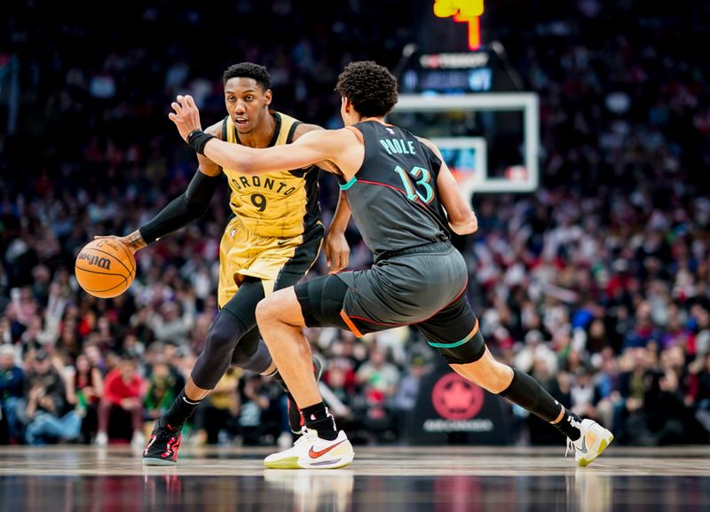 TORONTO, ON - APRIL 7: RJ Barrett #9 of the Toronto Raptors dribbles against Jordan Poole #13 of the Washington Wizards during the first half at the Scotiabank Arena on April 7, 2024 in Toronto, Ontario, Canada. NOTE TO USER: User expressly acknowledges and agrees that, by downloading and/or using this Photograph, user is consenting to the terms and conditions of the Getty Images License Agreement. (Photo by Mark Blinch/Getty Images)