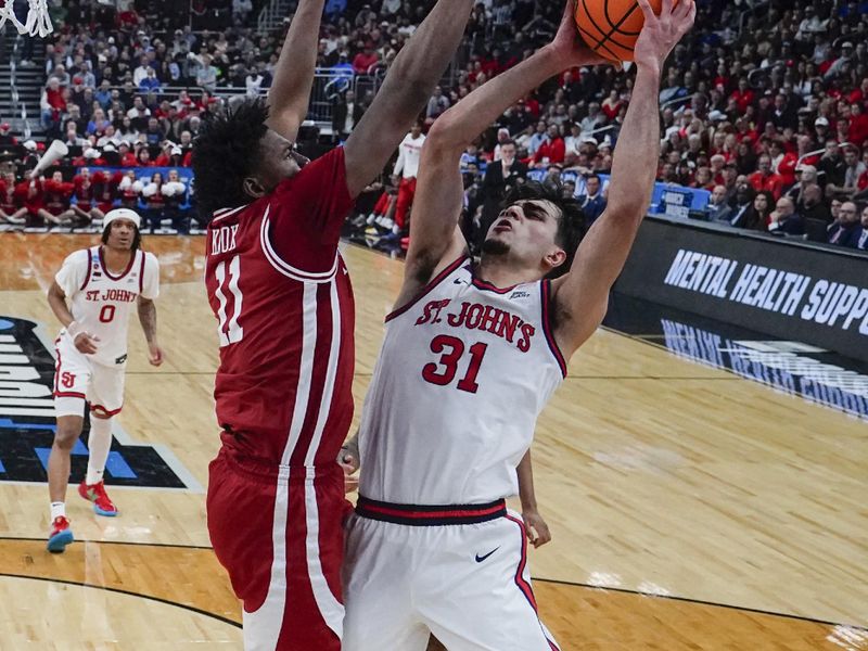 Arkansas Razorbacks Overcome St. John's Red Storm in Providence Playoff Battle