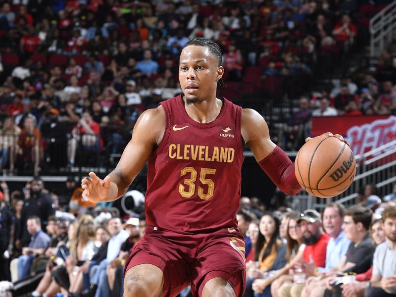 HOUSTON, TX - MARCH 16:  Isaac Okoro #35 of the Cleveland Cavaliers dribbles the ball during the game against the Houston Rockets on March 16, 2023 at the Toyota Center in Houston, Texas. NOTE TO USER: User expressly acknowledges and agrees that, by downloading and or using this photograph, User is consenting to the terms and conditions of the Getty Images License Agreement. Mandatory Copyright Notice: Copyright 2024 NBAE (Photo by Logan Riely/NBAE via Getty Images)