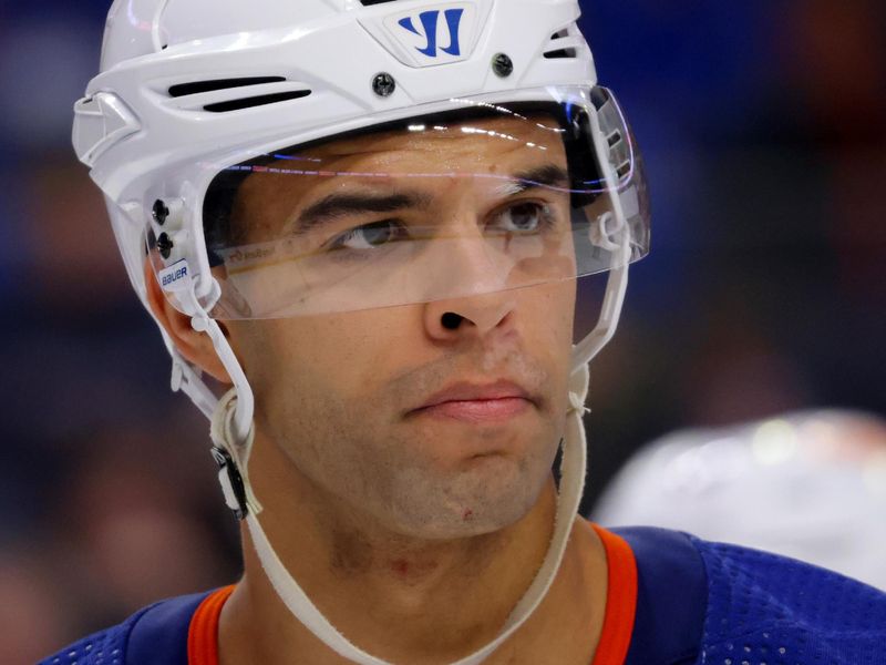 Mar 9, 2024; Buffalo, New York, USA;  Edmonton Oilers defenseman Darnell Nurse (25) during a stoppage in play against the Buffalo Sabres during the second period at KeyBank Center. Mandatory Credit: Timothy T. Ludwig-USA TODAY Sports