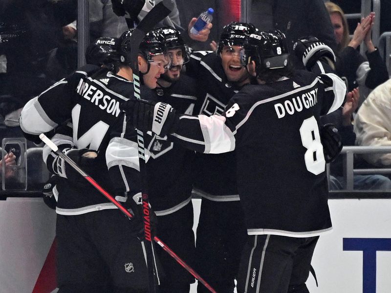 Jan 5, 2023; Los Angeles, California, USA;  Los Angeles Kings celebrate after a goal in the first period against the Boston Bruins at Crypto.com Arena. Mandatory Credit: Jayne Kamin-Oncea-USA TODAY Sports