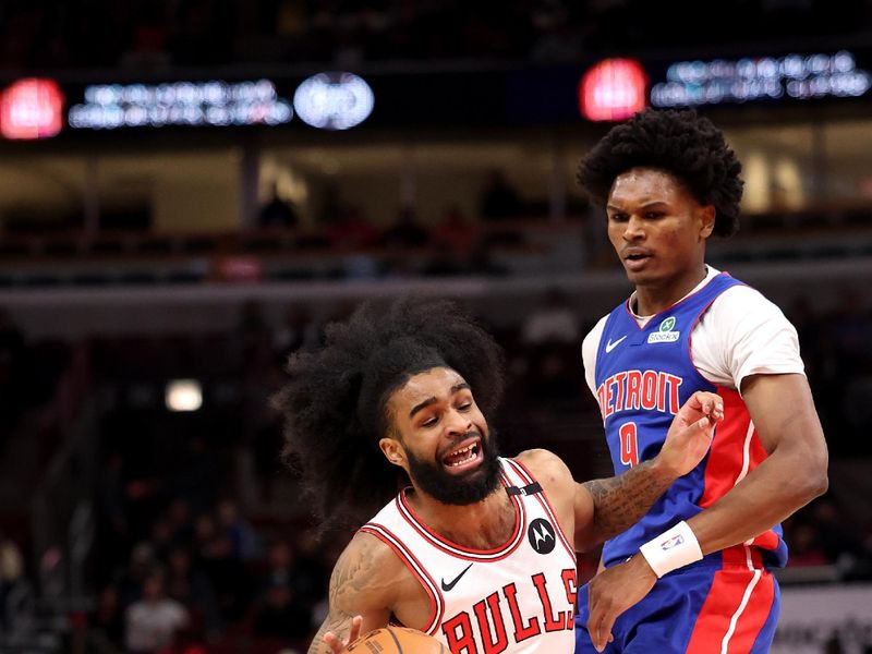 CHICAGO, ILLINOIS - FEBRUARY 12: Coby White #0 of the Chicago Bulls dribbles the ball as Ausar Thompson #9 of the Detroit Pistons defends during the first quarter at the United Center on February 12, 2025 in Chicago, Illinois. NOTE TO USER: User expressly acknowledges and agrees that, by downloading and or using this photograph, user is consenting to the terms and conditions of the Getty Images License Agreement.  (Photo by Luke Hales/Getty Images)