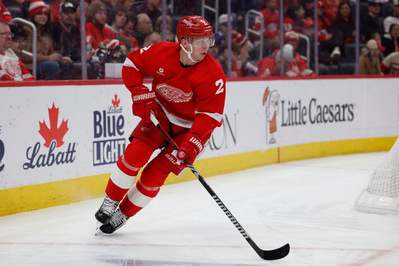 Feb 29, 2024; Detroit, Michigan, USA;  Detroit Red Wings defenseman Olli Maatta (2) controls the puck in the first period against the New York Islanders at Little Caesars Arena. Mandatory Credit: Rick Osentoski-USA TODAY Sports