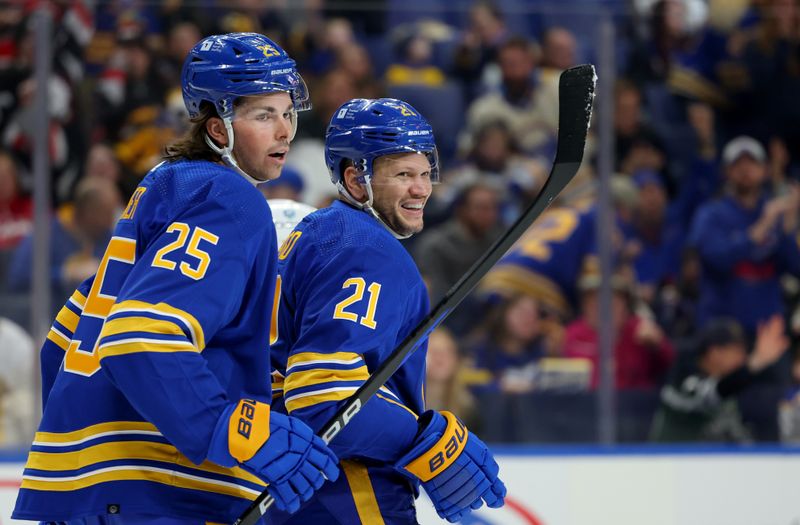 Feb 10, 2024; Buffalo, New York, USA;  Buffalo Sabres right wing Kyle Okposo (21) reacts after scoring a goal during the second period against the St. Louis Blues at KeyBank Center. Mandatory Credit: Timothy T. Ludwig-USA TODAY Sports