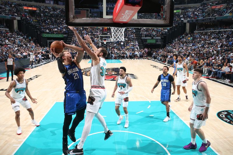 MEMPHIS, TN - OCTOBER 26: Moritz Wagner #21 of the Orlando Magic drives to the basket during the game against the Memphis Grizzlies on October 26, 2024 at FedExForum in Memphis, Tennessee. NOTE TO USER: User expressly acknowledges and agrees that, by downloading and or using this photograph, User is consenting to the terms and conditions of the Getty Images License Agreement. Mandatory Copyright Notice: Copyright 2024 NBAE (Photo by Joe Murphy/NBAE via Getty Images)