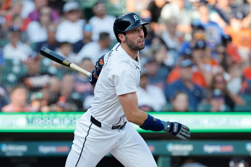 Aug 3, 2024; Detroit, Michigan, USA;  Detroit Tigers third baseman Matt Vierling (8) hits a double in the first inning against the Kansas City Royals at Comerica Park. Mandatory Credit: Rick Osentoski-USA TODAY Sports