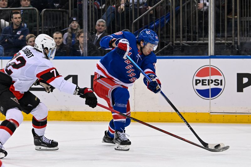 Jan 21, 2025; New York, New York, USA;  New York Rangers left wing Will Cuylle (50) attempts a shot defended by Ottawa Senators defenseman Thomas Chabot (72) during the second period at Madison Square Garden. Mandatory Credit: Dennis Schneidler-Imagn Images