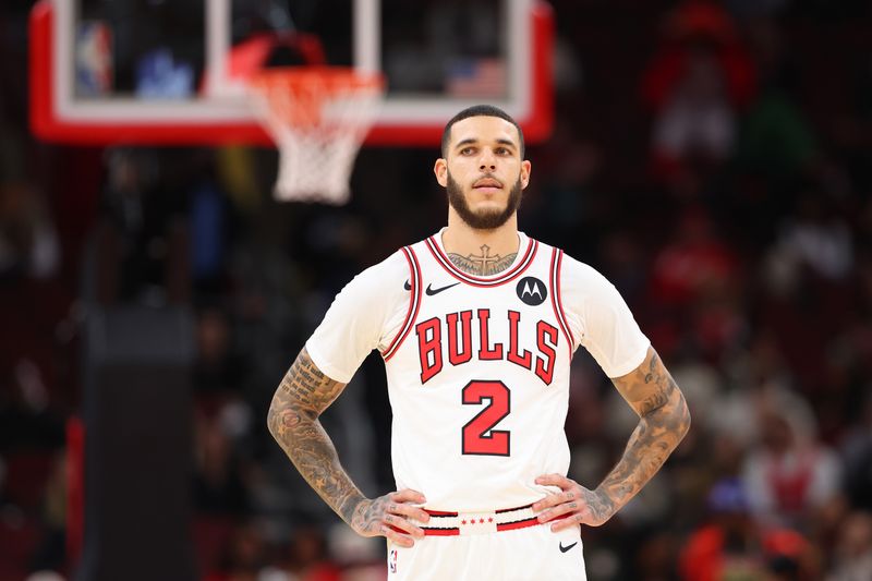 CHICAGO, ILLINOIS - OCTOBER 16: Lonzo Ball #2 of the Chicago Bulls looks on against the Minnesota Timberwolves during the first half of a preseason game at the United Center on October 16, 2024 in Chicago, Illinois. NOTE TO USER: User expressly acknowledges and agrees that, by downloading and or using this photograph, User is consenting to the terms and conditions of the Getty Images License Agreement.  (Photo by Michael Reaves/Getty Images)