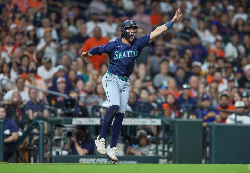 May 3, 2024; Houston, Texas, USA; Seattle Mariners third baseman Josh Rojas (4) shouts to a teammate on a play during the eighth inning against the Houston Astros at Minute Maid Park. Mandatory Credit: Troy Taormina-USA TODAY Sports