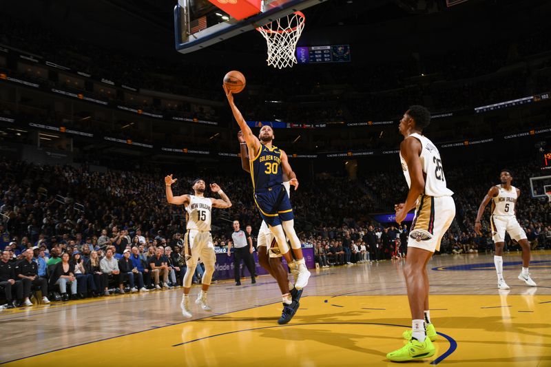 SAN FRANCISCO, CA - APRIL 12:  Stephen Curry #30 of the Golden State Warriors goes to the basket during the game on April 12, 2024 at Chase Center in San Francisco, California. NOTE TO USER: User expressly acknowledges and agrees that, by downloading and or using this photograph, user is consenting to the terms and conditions of Getty Images License Agreement. Mandatory Copyright Notice: Copyright 2024 NBAE (Photo by Noah Graham/NBAE via Getty Images)