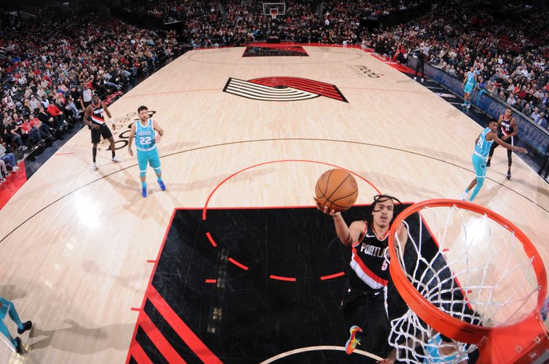 PORTLAND, OR - FEBRUARY 25:  Dalano Banton #5 of the Portland Trail Blazers goes to the basket during the game on February 25, 2024 at the Moda Center Arena in Portland, Oregon. NOTE TO USER: User expressly acknowledges and agrees that, by downloading and or using this photograph, user is consenting to the terms and conditions of the Getty Images License Agreement. Mandatory Copyright Notice: Copyright 2024 NBAE (Photo by Cameron Browne/NBAE via Getty Images)