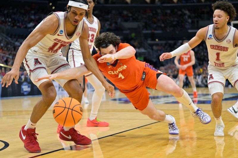 Mar 30, 2024; Los Angeles, CA, USA; Clemson Tigers forward Ian Schieffelin (4) reaches for the loose ball against Alabama Crimson Tide guard Mark Sears (1) and forward Jarin Stevenson (15) in the first half in the finals of the West Regional of the 2024 NCAA Tournament at Crypto.com Arena. Mandatory Credit: Jayne Kamin-Oncea-USA TODAY Sports