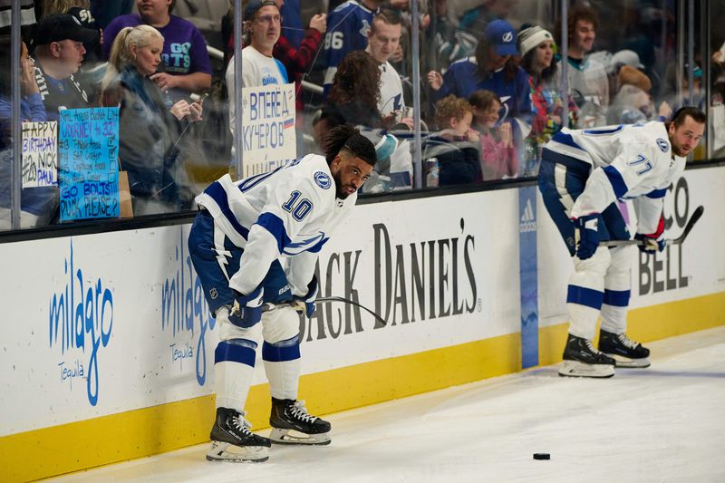 Mar 21, 2024; San Jose, California, USA; Tampa Bay Lightning left wing Anthony Duclair (10) and defenseman Victor Hedman (77) warm up before the game against the San Jose Sharks at SAP Center at San Jose. Mandatory Credit: Robert Edwards-USA TODAY Sports