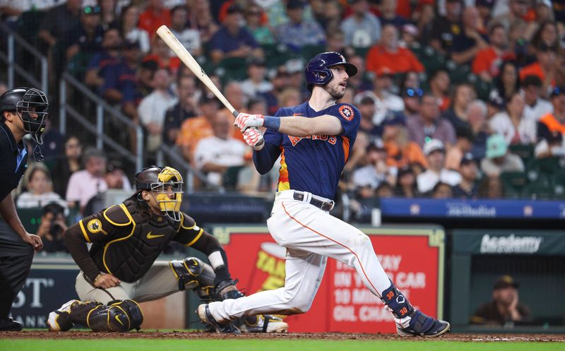 Sep 10, 2023; Houston, Texas, USA; Houston Astros right fielder Kyle Tucker (30) hits a triple during the sixth inning against the San Diego Padres at Minute Maid Park. Mandatory Credit: Troy Taormina-USA TODAY Sports