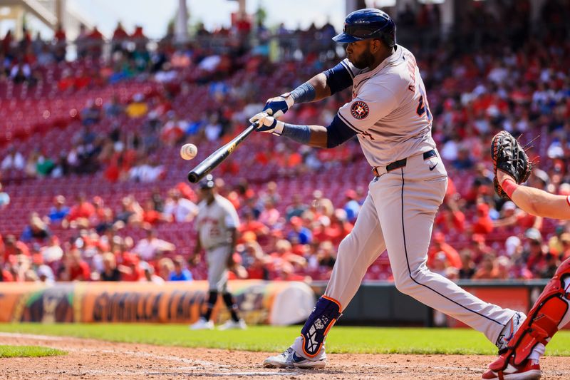 Sep 5, 2024; Cincinnati, Ohio, USA; Houston Astros designated hitter Yordan Alvarez (44) hits a single against the Cincinnati Reds in the eighth inning at Great American Ball Park. Mandatory Credit: Katie Stratman-Imagn Images