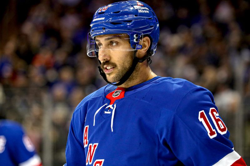 Nov 25, 2024; New York, New York, USA; New York Rangers center Vincent Trocheck (16) skates against the St. Louis Blues during the first period at Madison Square Garden. Mandatory Credit: Danny Wild-Imagn Images