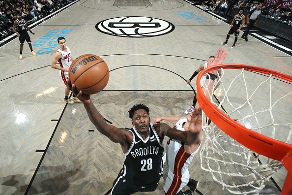 BROOKLYN, NY - NOVEMBER 25: Dorian Finney-Smith #28 of the Brooklyn Nets drives to the basket during the game against the Miami Heat on November 25, 2023 at Barclays Center in Brooklyn, New York. NOTE TO USER: User expressly acknowledges and agrees that, by downloading and or using this Photograph, user is consenting to the terms and conditions of the Getty Images License Agreement. Mandatory Copyright Notice: Copyright 2023 NBAE (Photo by Nathaniel S. Butler/NBAE via Getty Images)