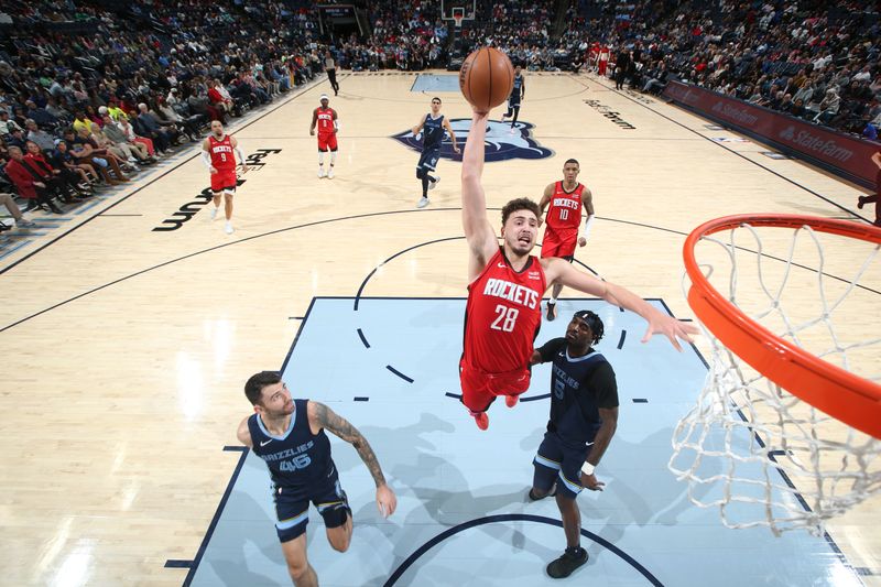 MEMPHIS, TN - FEBRUARY 14: Alperen Sengun #28 of the Houston Rockets drives to the basket during the game against the Memphis Grizzlies on February 14, 2024 at FedExForum in Memphis, Tennessee. NOTE TO USER: User expressly acknowledges and agrees that, by downloading and or using this photograph, User is consenting to the terms and conditions of the Getty Images License Agreement. Mandatory Copyright Notice: Copyright 2024 NBAE (Photo by Joe Murphy/NBAE via Getty Images)