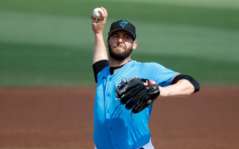 Mar 7, 2023; Jupiter, Florida, USA; Miami Marlins pitcher Dylan Floro (36) pitches against the Washington Nationals in the fourth inning at Roger Dean Stadium. Mandatory Credit: Rhona Wise-USA TODAY Sports