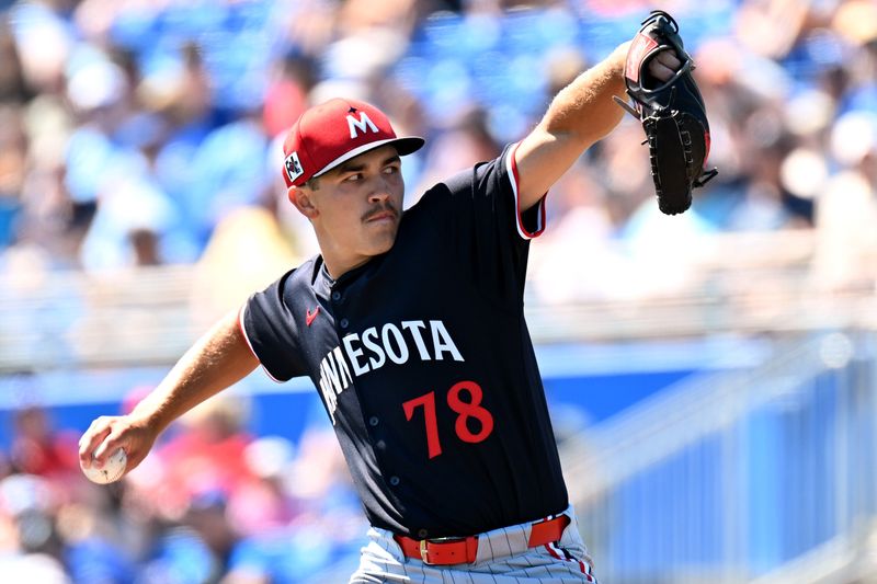 Mar 11, 2025; Dunedin, Florida, USA; Minnesota Twins starting pitcher Andrew Morris (78) throws a pitch in the first inning against the Toronto Blue Jays during spring training  at TD Ballpark. Mandatory Credit: Jonathan Dyer-Imagn Images