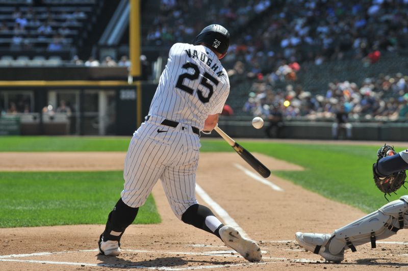 Aug 25, 2024; Chicago, Illinois, USA; Chicago White Sox first base Andrew Vaughn (25) hits an RBI double during the first inning against the Detroit Tigers at Guaranteed Rate Field. Mandatory Credit: Patrick Gorski-USA TODAY Sports