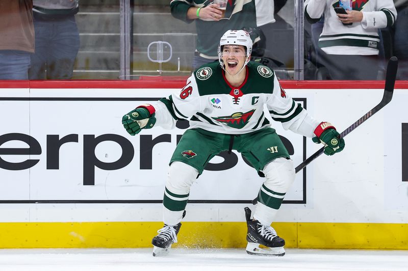 Nov 30, 2024; Saint Paul, Minnesota, USA; Minnesota Wild defenseman Jared Spurgeon (46) celebrates his game winning goal in overtime against the Nashville Predators at Xcel Energy Center. Mandatory Credit: Matt Krohn-Imagn Images