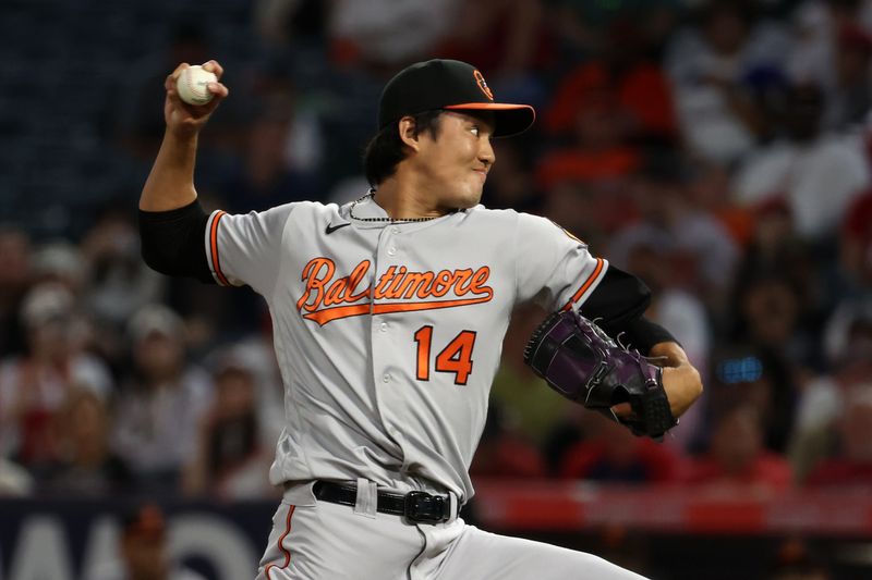 Sep 6, 2023; Anaheim, California, USA; Baltimore Orioles relief pitcher Shintaro Fujinami (14) pitches during the eighth inning against the Los Angeles Angels at Angel Stadium. Mandatory Credit: Kiyoshi Mio-USA TODAY Sports