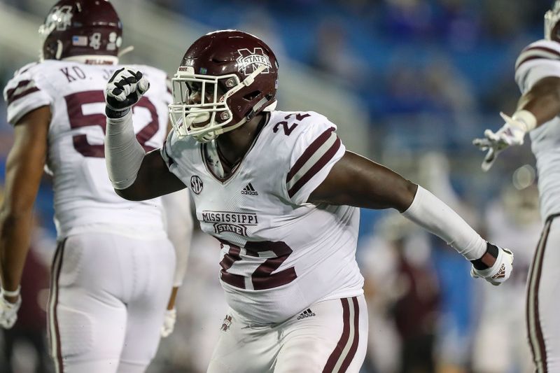 Oct 10, 2020; Lexington, Kentucky, USA; Mississippi State Bulldogs defensive tackle Nathan Pickering (22) celebrates after a sack against the Kentucky Wildcats in the second half at Kroger Field. Mandatory Credit: Katie Stratman-USA TODAY Sports