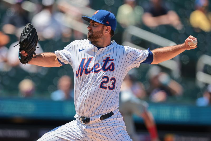 Jul 11, 2024; New York City, New York, USA; New York Mets starting pitcher David Peterson (23) delivers a pitch during the first inning against the Washington Nationals at Citi Field. Mandatory Credit: Vincent Carchietta-USA TODAY Sports