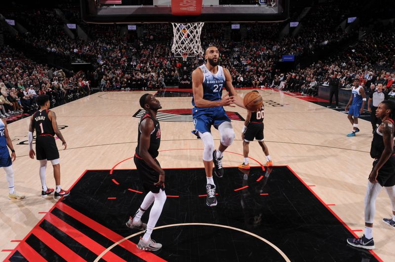 PORTLAND, OR - FEBRUARY 15: Rudy Gobert #27 of the Minnesota Timberwolves drives to the basket during the game against the Portland Trail Blazers on February 15, 2024 at the Moda Center Arena in Portland, Oregon. NOTE TO USER: User expressly acknowledges and agrees that, by downloading and or using this photograph, user is consenting to the terms and conditions of the Getty Images License Agreement. Mandatory Copyright Notice: Copyright 2024 NBAE (Photo by Cameron Browne/NBAE via Getty Images)