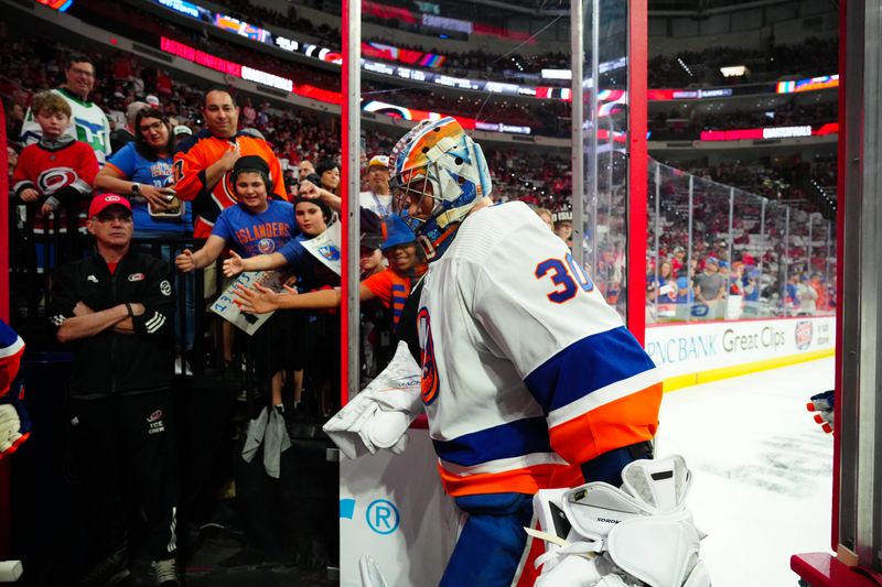 Apr 20, 2024; Raleigh, North Carolina, USA; New York Islanders goaltender Ilya Sorokin (30) comes off the ice after the warmups before the game against the Carolina Hurricanes in game one of the first round of the 2024 Stanley Cup Playoffs at PNC Arena. Mandatory Credit: James Guillory-USA TODAY Sports