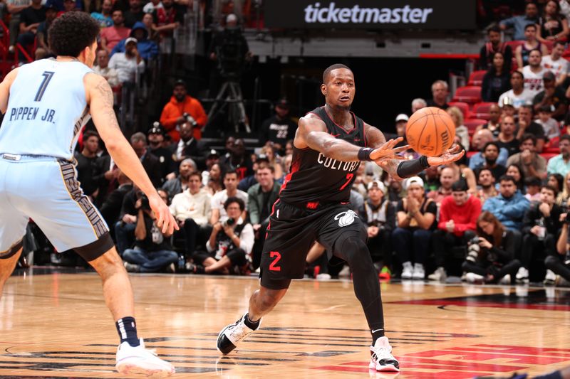 MIAMI, FL - JANUARY 24:  Terry Rozier #2 of the Miami Heat passes the ball during the game against the Memphis Grizzlies on January 24, 2024 at Kaseya Center in Miami, Florida. NOTE TO USER: User expressly acknowledges and agrees that, by downloading and or using this Photograph, user is consenting to the terms and conditions of the Getty Images License Agreement. Mandatory Copyright Notice: Copyright 2024 NBAE (Photo by Issac Baldizon/NBAE via Getty Images)