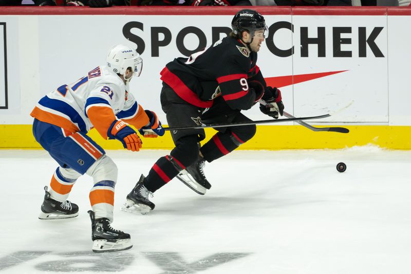 Dec 8, 2024; Ottawa, Ontario, CAN; Ottawa Senators center Josh Norris (9) moves the puck away from New York Islanders center kyle Palmieri (21) in the third period at the Canadian Tire Centre. Mandatory Credit: Marc DesRosiers-Imagn Images