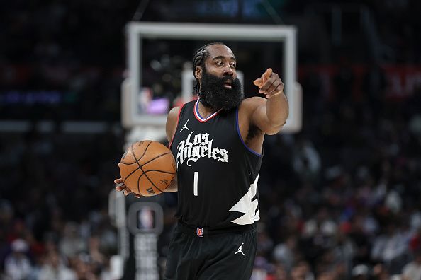 LOS ANGELES, CALIFORNIA - DECEMBER 06: James Harden #1 of the LA Clippers signals with the ball against the Denver Nuggets during the second half a game at Crypto.com Arena on December 06, 2023 in Los Angeles, California. NOTE TO USER: User expressly acknowledges and agrees that, by downloading and or using this photograph, User is consenting to the terms and conditions of the Getty Images License Agreement.  (Photo by Michael Owens/Getty Images)