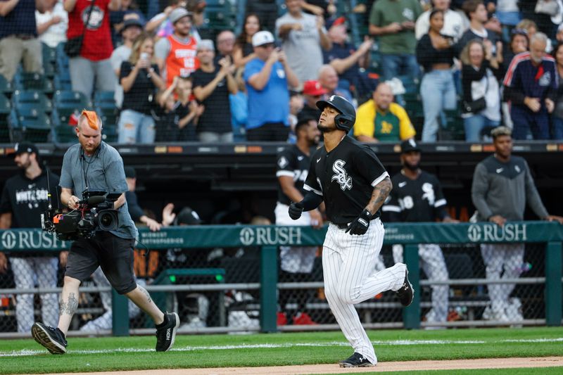 Aug 26, 2023; Chicago, Illinois, USA; Chicago White Sox second baseman Lenyn Sosa (50) rounds the bases after hitting a solo home run against the Oakland Athletics during the second inning at Guaranteed Rate Field. Mandatory Credit: Kamil Krzaczynski-USA TODAY Sports