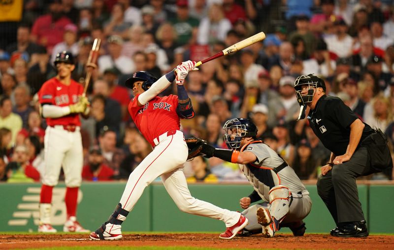 May 31, 2024; Boston, Massachusetts, USA; Boston Red Sox center fielder Ceddanne Rafaela (43) hits a three run home run against the Detroit Tigers in the fourth inning at Fenway Park. Mandatory Credit: David Butler II-USA TODAY Sports