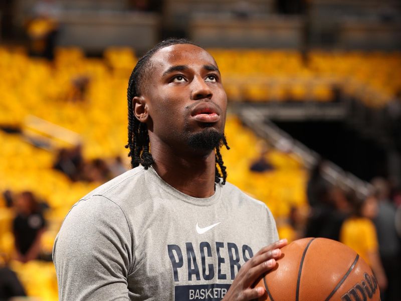 INDIANAPOLIS, IN - MAY 9: Aaron Nesmith #23 of the Indiana Pacers warms up before the game against the Cleveland Cavaliers during Round 2 Game 3 on May 9, 2025 at Gainbridge Fieldhouse in Indianapolis, Indiana. NOTE TO USER: User expressly acknowledges and agrees that, by downloading and or using this Photograph, user is consenting to the terms and conditions of the Getty Images License Agreement. Mandatory Copyright Notice: Copyright 2025 NBAE (Photo by Joe Murphy/NBAE via Getty Images)