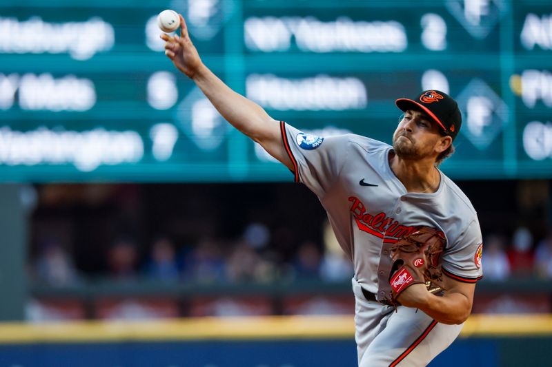 Jul 3, 2024; Seattle, Washington, USA; Baltimore Orioles starting pitcher Dean Kremer (64) throws against the Seattle Mariners during the first inning at T-Mobile Park. Mandatory Credit: Joe Nicholson-USA TODAY Sports