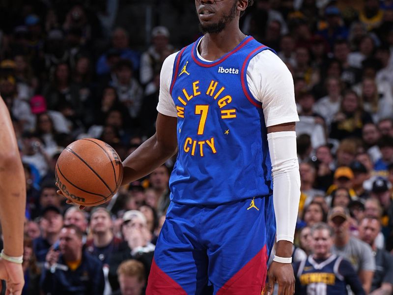 DENVER, CO - APRIL 20: Reggie Jackson #7 of the Denver Nuggets dribbles the ball during the game against the Los Angeles Lakers during Round 1 Game 1 of the 2024 NBA Playoffs on April 20, 2024 at the Ball Arena in Denver, Colorado. NOTE TO USER: User expressly acknowledges and agrees that, by downloading and/or using this Photograph, user is consenting to the terms and conditions of the Getty Images License Agreement. Mandatory Copyright Notice: Copyright 2024 NBAE (Photo by Garrett Ellwood/NBAE via Getty Images)