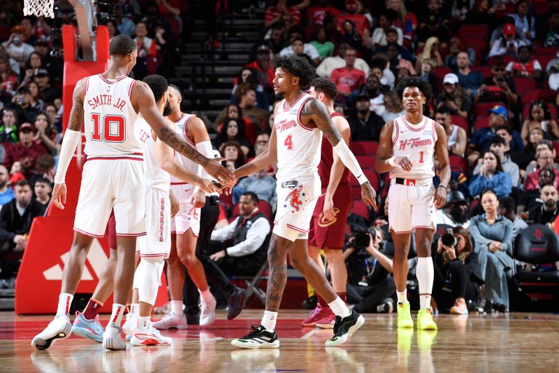 HOUSTON, TX - MARCH 16:  Jalen Green #4 and Jabari Smith Jr. #10 of the Houston Rockets high five during the game against the Cleveland Cavaliers on March 16, 2023 at the Toyota Center in Houston, Texas. NOTE TO USER: User expressly acknowledges and agrees that, by downloading and or using this photograph, User is consenting to the terms and conditions of the Getty Images License Agreement. Mandatory Copyright Notice: Copyright 2024 NBAE (Photo by Logan Riely/NBAE via Getty Images)