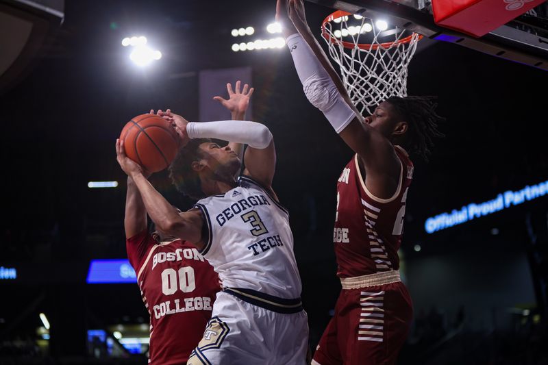 Jan 4, 2025; Atlanta, Georgia, USA; Georgia Tech Yellow Jackets guard Jaeden Mustaf (3) is defended by Boston College Eagles guard DJ Steward (00) and forward Jayden Hastings (22) in the second half at McCamish Pavilion. Mandatory Credit: Brett Davis-Imagn Images