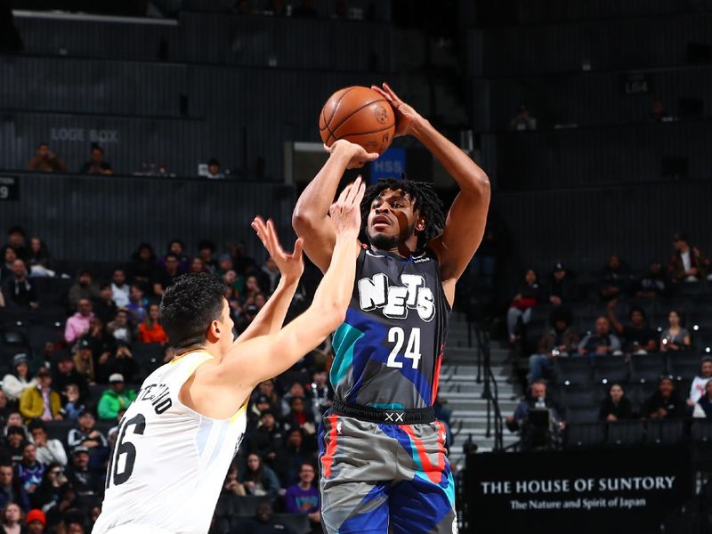 BROOKLYN, NY - JANUARY 29: Cam Thomas #24 of the Brooklyn Nets shoots a three point basket against the Utah Jazz on January 29, 2024 at Barclays Center in Brooklyn, New York. NOTE TO USER: User expressly acknowledges and agrees that, by downloading and or using this Photograph, user is consenting to the terms and conditions of the Getty Images License Agreement. Mandatory Copyright Notice: Copyright 2024 NBAE (Photo by David L. Nemec/NBAE via Getty Images)