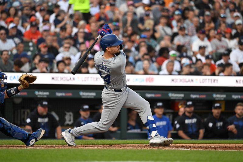 Jul 12, 2024; Detroit, Michigan, USA; Los Angeles Dodgers center fielder Andy Pages (44) hits a single to drive in a run against the Detroit Tigers in the fourth inning at Comerica Park. Mandatory Credit: Lon Horwedel-USA TODAY Sports