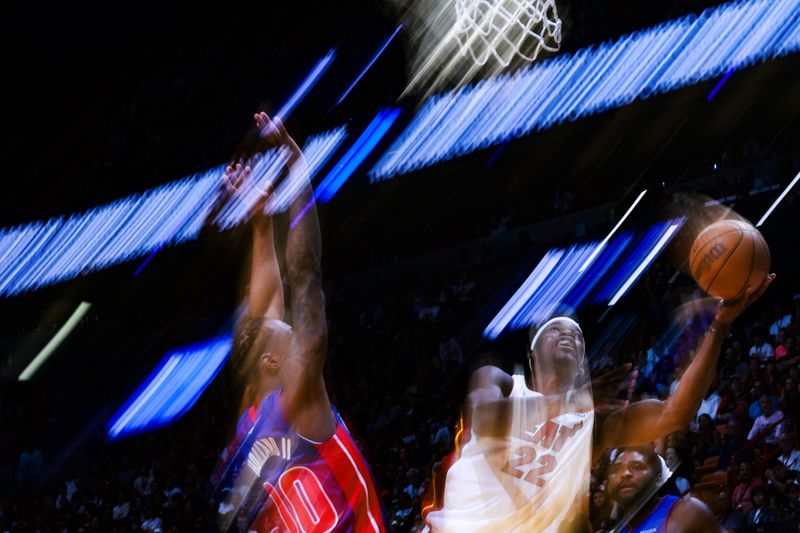 MIAMI, FLORIDA - OCTOBER 28: Jimmy Butler #22 of the Miami Heat shoots against the Detroit Pistons during the second half at Kaseya Center on October 28, 2024 in Miami, Florida. NOTE TO USER: User expressly acknowledges and agrees that, by downloading and or using this photograph, User is consenting to the terms and conditions of the Getty Images License Agreement. (Photo by Carmen Mandato/Getty Images)