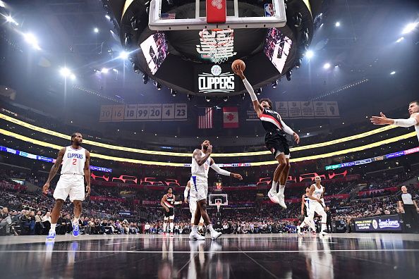 LOS ANGELES, CA - DECEMBER 11: Matisse Thybulle #4 of the Portland Trail Blazers drives to the basket during the game against the LA Clippers on December 11, 2023 at Crypto.Com Arena in Los Angeles, California. NOTE TO USER: User expressly acknowledges and agrees that, by downloading and/or using this Photograph, user is consenting to the terms and conditions of the Getty Images License Agreement. Mandatory Copyright Notice: Copyright 2023 NBAE (Photo by Adam Pantozzi/NBAE via Getty Images)