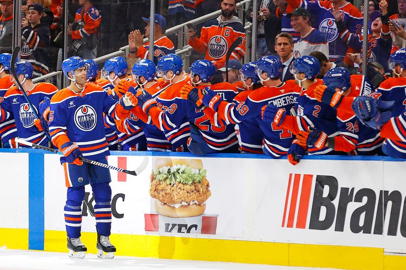 Nov 14, 2024; Edmonton, Alberta, CAN; The Edmonton Oilers celebrate a goal scored by defensemen Darnell Nurse (25) during the second period against the Nashville Predators at Rogers Place. Mandatory Credit: Perry Nelson-Imagn Images